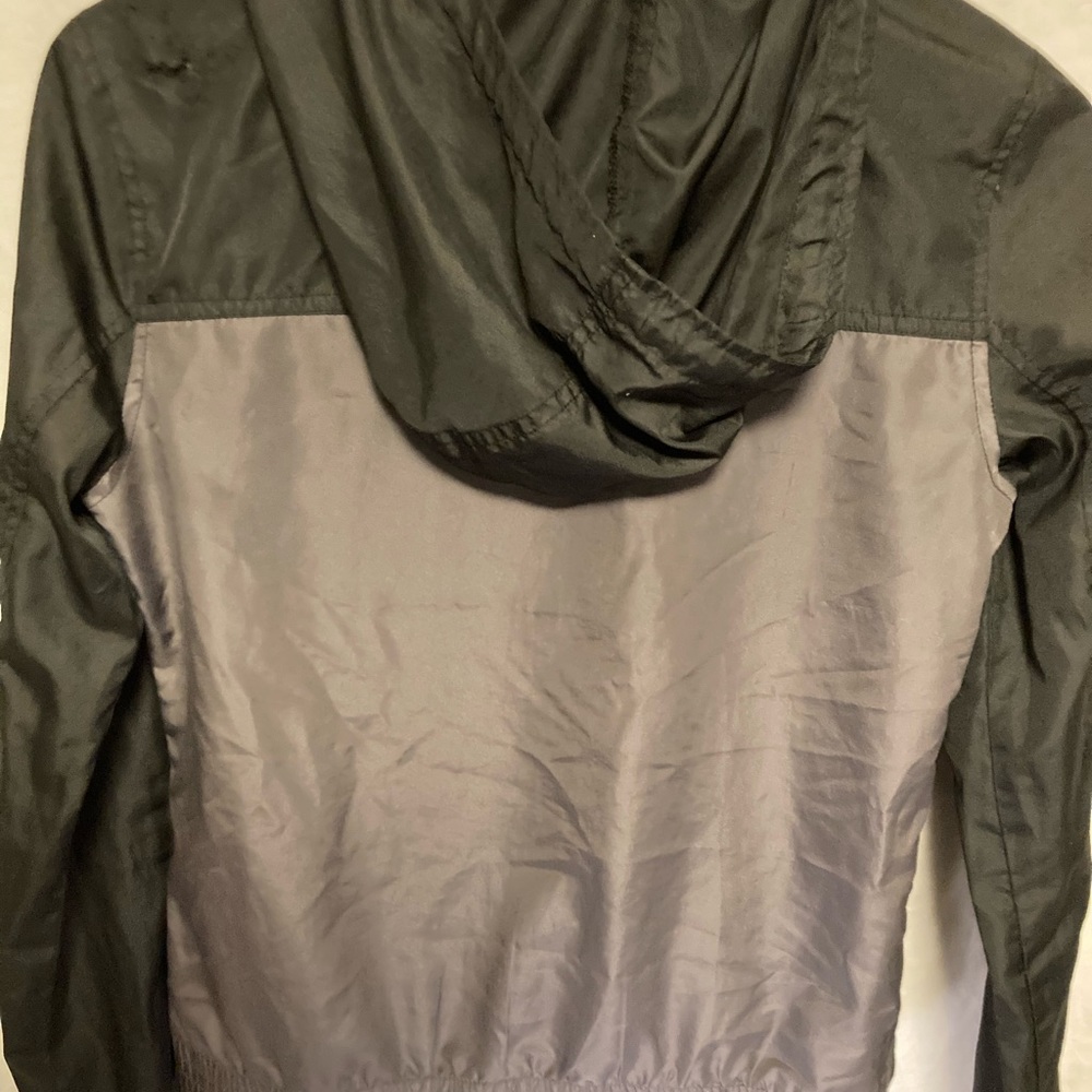 Black windbreaker